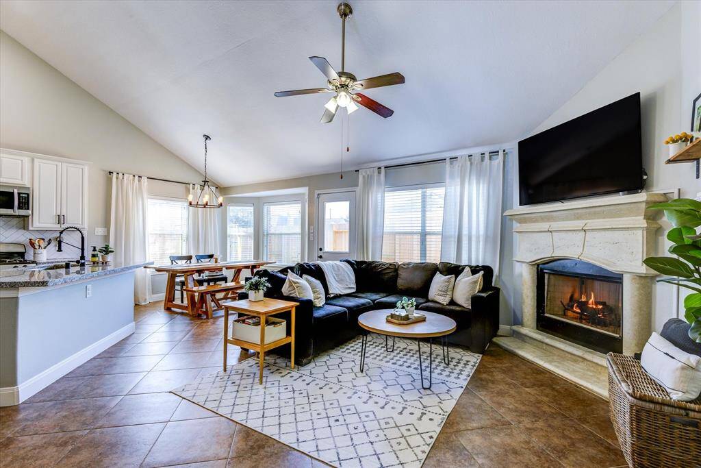 The amount of natural light coming into the main living area is gorgeous. Wonderful open concept great for hosting friends and family!