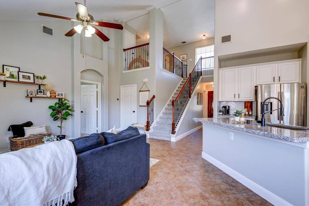 Great view of the upstairs play area/den from the breakfast area. No matter where you are at downstairs it easy to know what's going on upstairs!