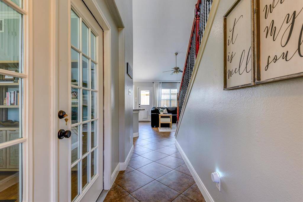 Notice the office space to the left as you enter; can easily double as a fifth bedroom if desired!