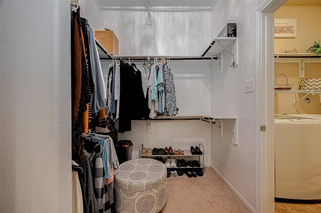 Primary Closet connects to the laundry room
