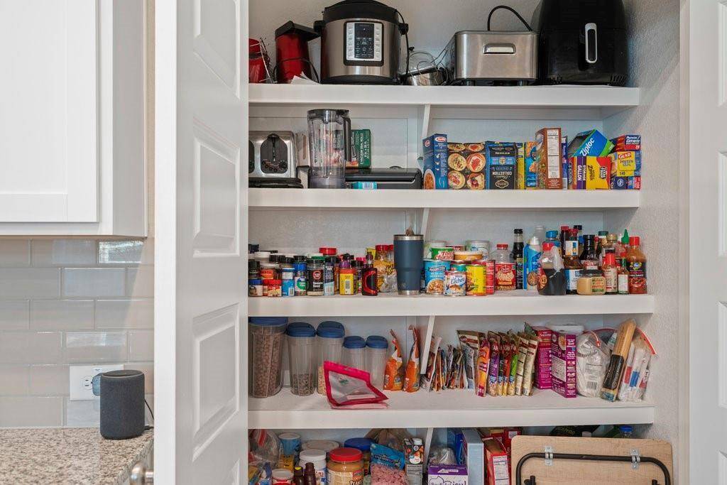 Oversized pantry with ample storage space.