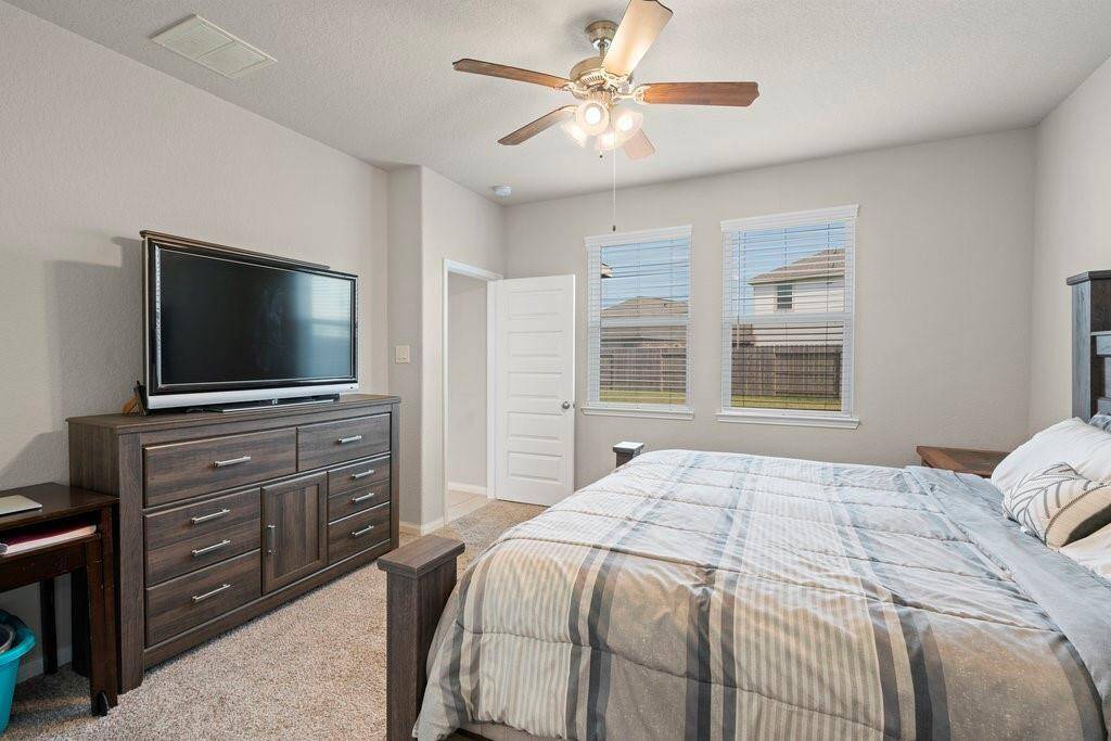 Spacious primary bedroom on the main level.