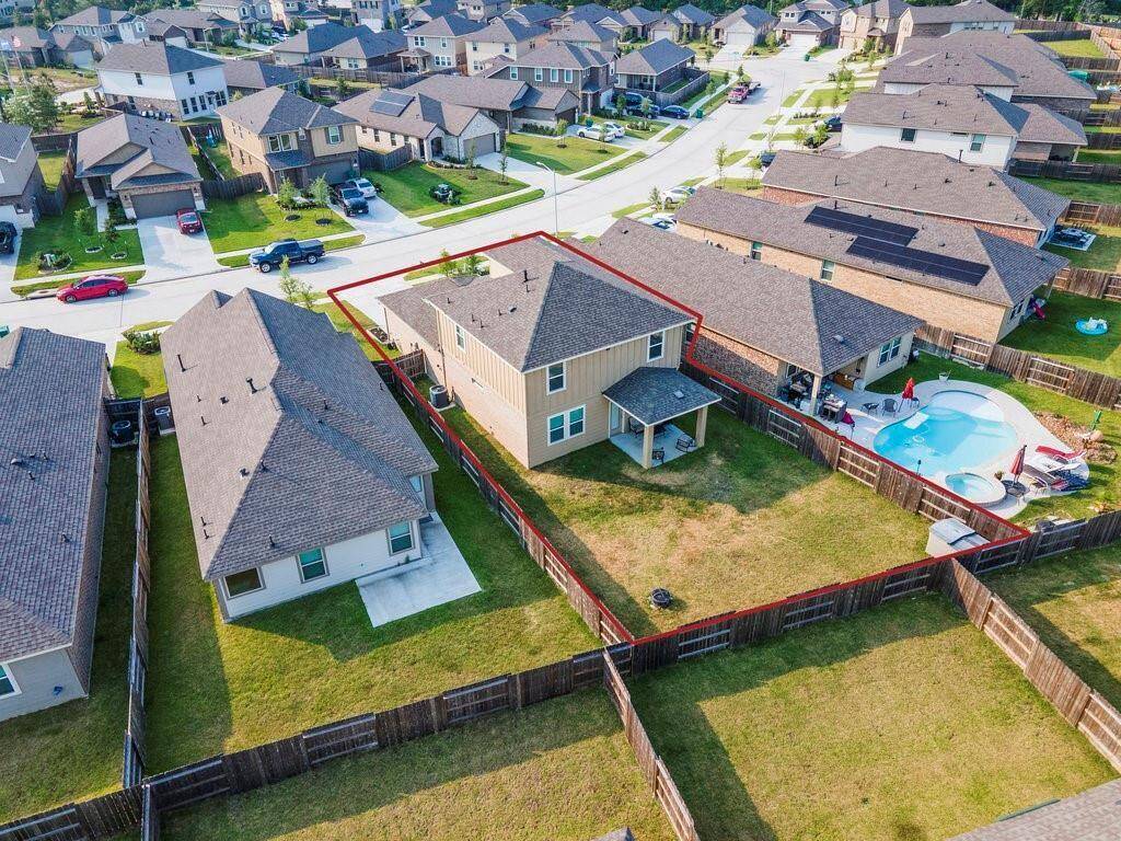 Nice sized backyard with a covered patio.