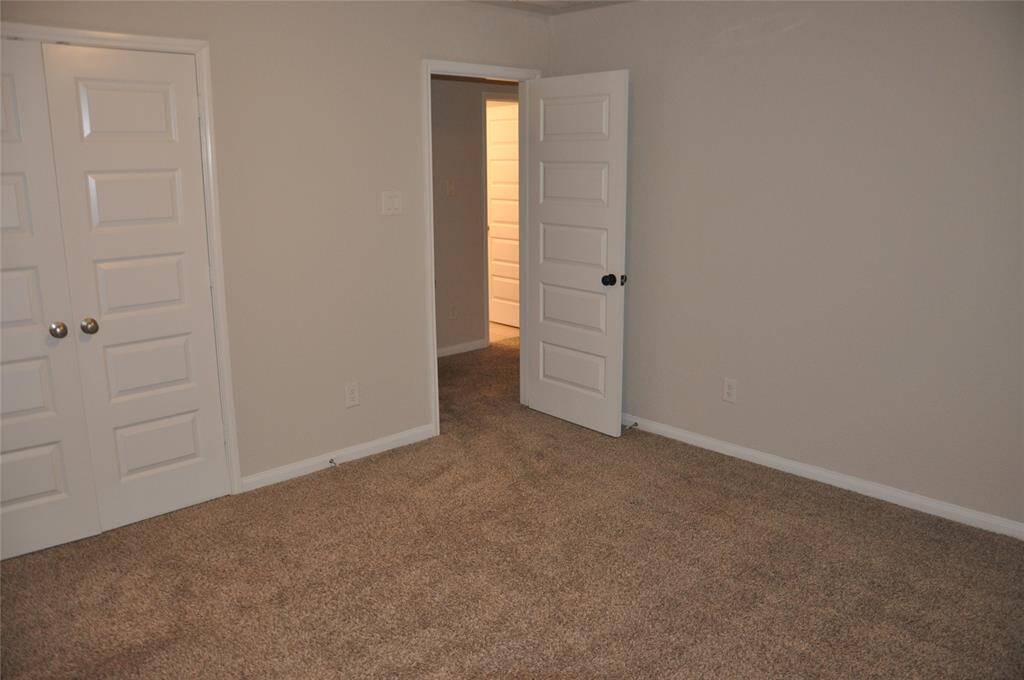 Second bedroom has a double door closet.