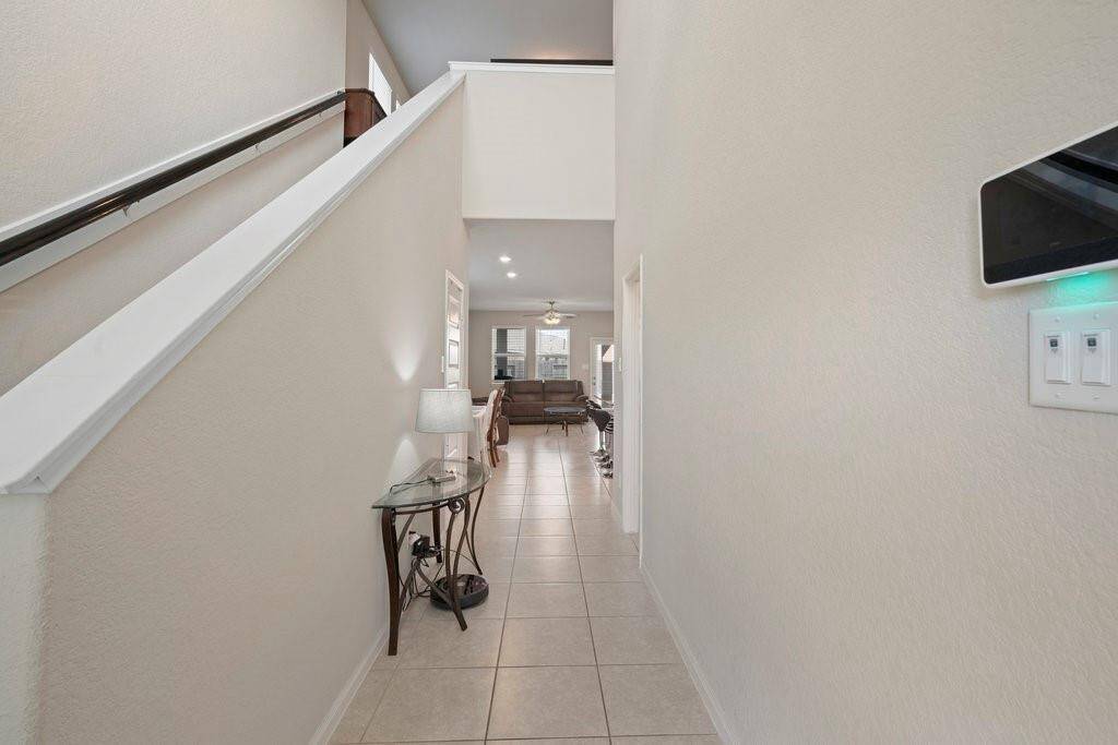 Stairway to the second floor from entry.