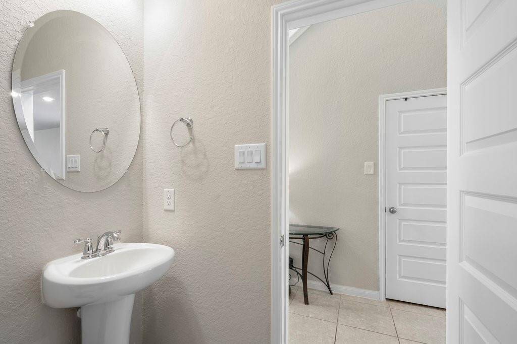 Half bath downstairs for guests.