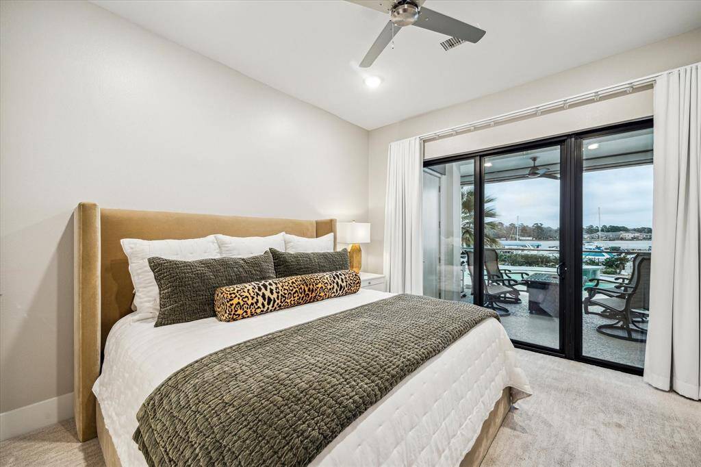 Wake up to the serenity of Lake Conroe right from your bedroom.
