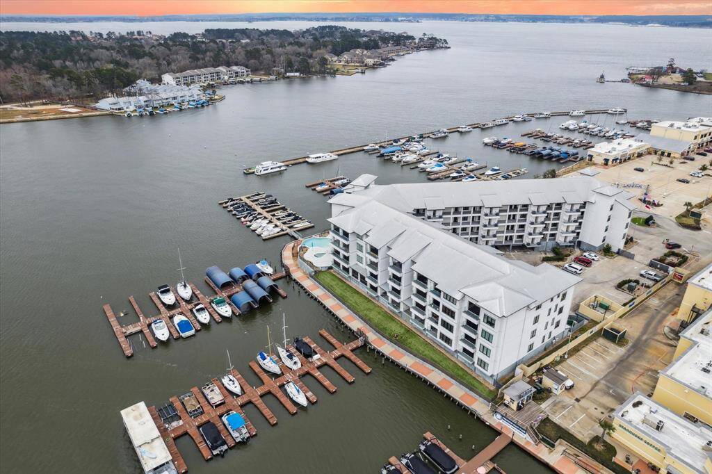 Discover unparalleled luxury at The Shoreline at Waterpoint, Montgomery's premier mid-rise condominium nestled on the serene shores of Lake Conroe.