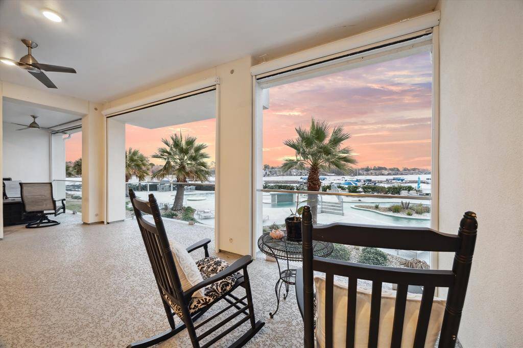 Glass railings leave unobstructed views and seamless connection with the indoor and outdoor spaces.