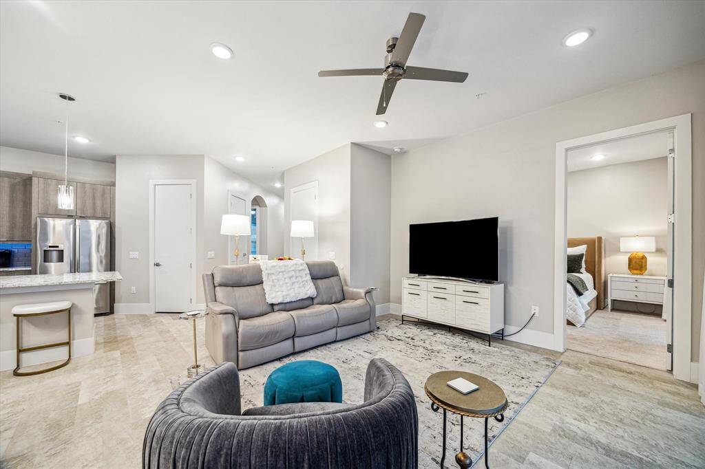 The open concept floor plan is truly lovely, offering a seamless flow between living spaces, creating an airy and inviting atmosphere perfect for both relaxation and entertaining.