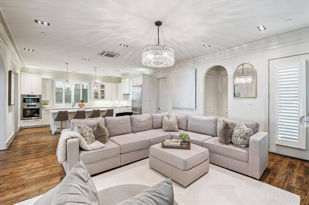 Fabulous Den is open to the Chef's Kitchen. French doors open to 2 separate courtyards/terraces with garden possibilities. The natural light is beautiful. A mudroom is off the Den as is the elevator.