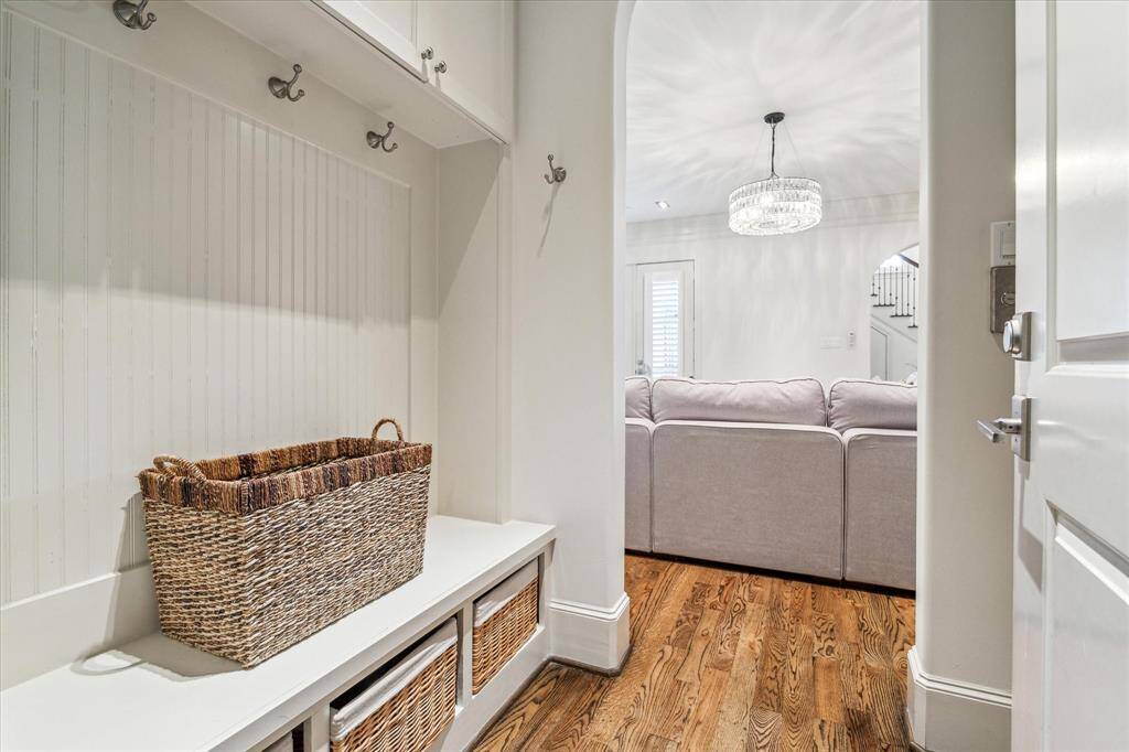 Yes, there is a Mudroom! This space is off the Kitchen. The elevator is located here as is the entrance to the 3-car garage.