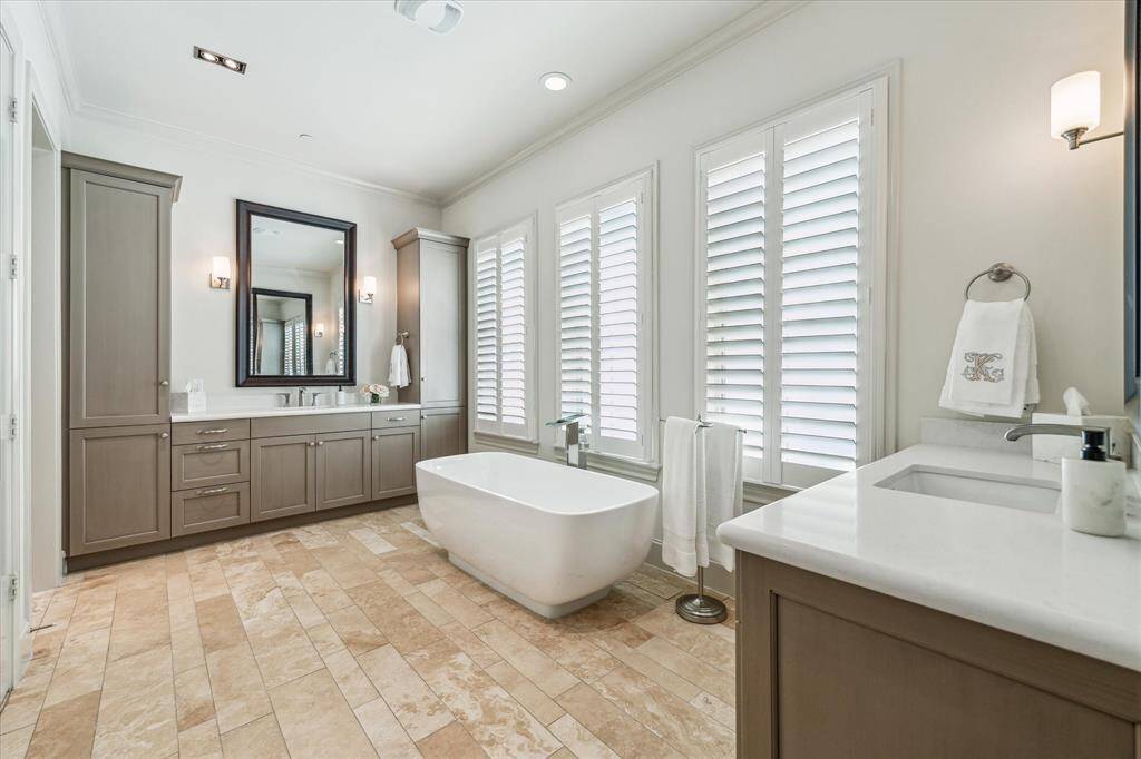 Enjoy the spa tub for a luxurious soak at the end of a long day.