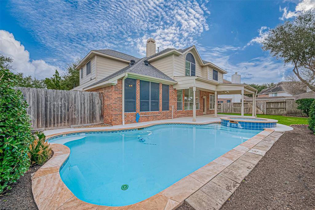 Get ready for our TEXAS summers with this cool backyard. Fabulous neighbors and location! An ample space to lounge, entertain, and soak up the sunshine, this inviting poolside escape is ready to bring your outdoor living dreams to life.