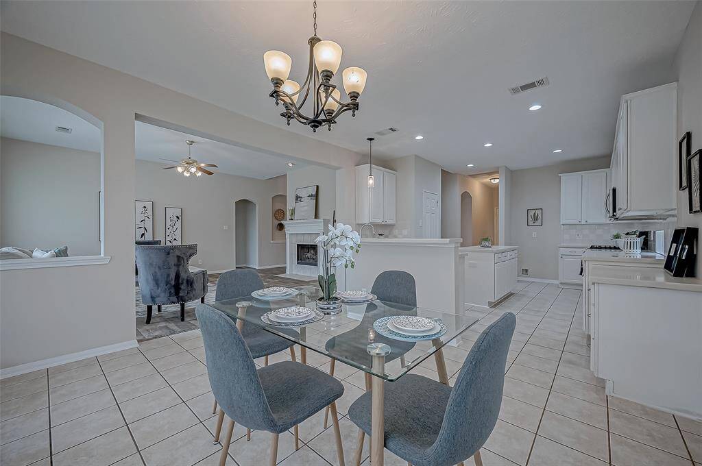 Your kitchen is perfectly positioned at the heart of the home, making it easy to stay connected whether you're prepping meals, enjoying breakfast, or chatting with family in the living area.