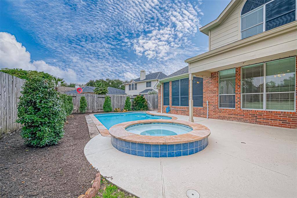 Imagine spending your weekends right here, where laughter echoes as you splash in the pool and unwind in the spa. This beautifully designed backyard offers the perfect setting for barbecues, poolside fun, and quality time with friends and family, making every day feel like a vacation in your own home.