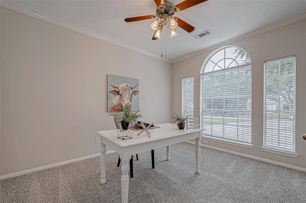 This bright and versatile space, bathed in natural light from the stunning arched window, is perfect as a home office or easily converted into a sixth bedroom to suit your needs. Whether you’re working from home or welcoming guests, the neutral tones and plush carpeting create a cozy and inviting atmosphere.