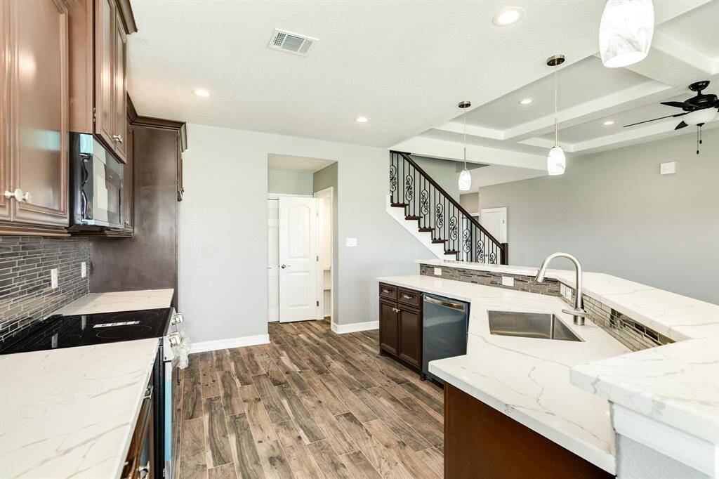 Gorgeous Quartz Countertops.  Smooth Top Cook Stove