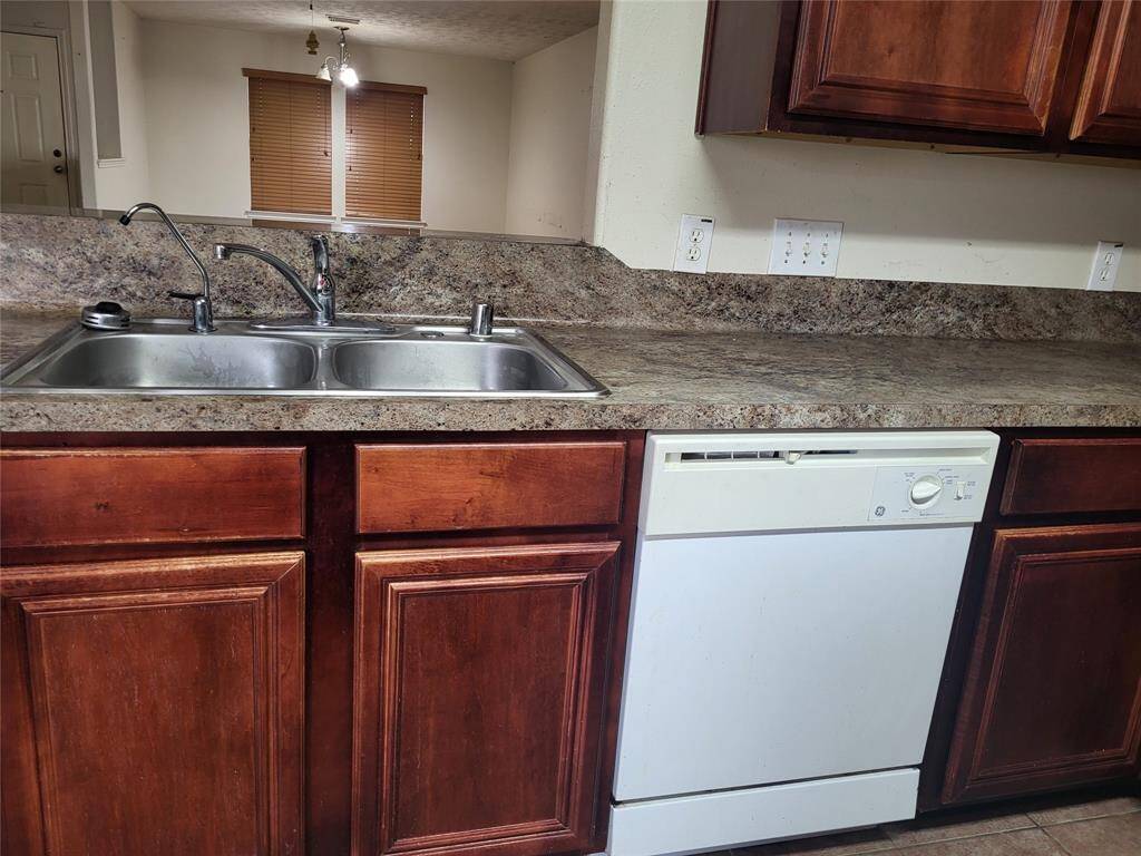 Kitchen closer view to sink and dishwasher