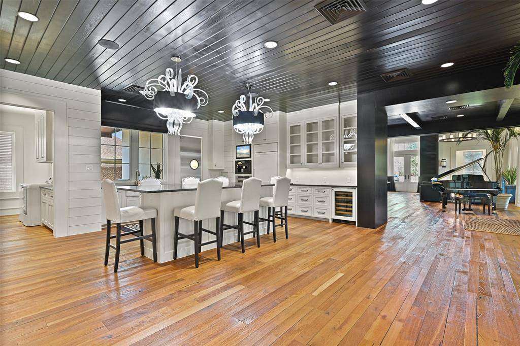 Sweeping views of the kitchen leading into the living spaces. The attention to detail and design from every angle is breathtaking.