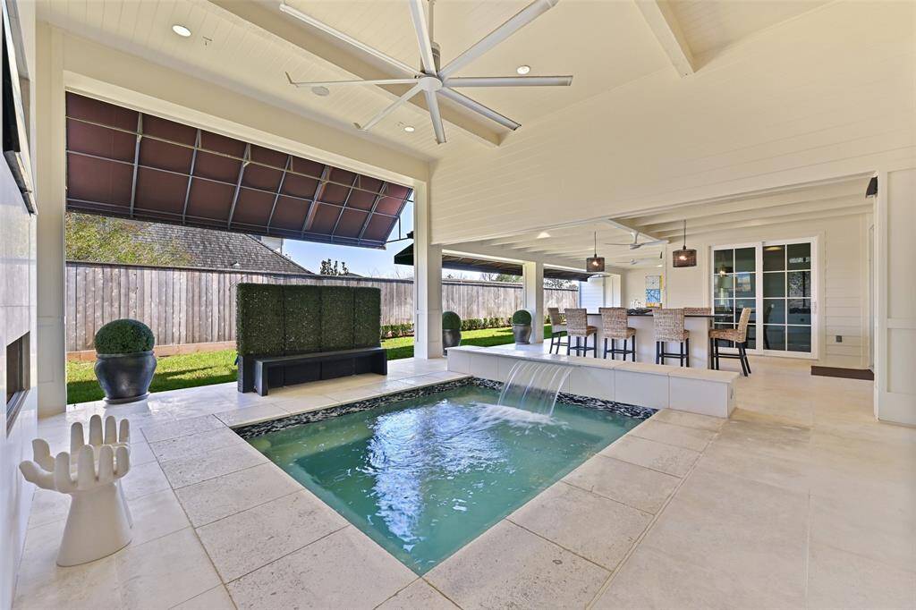 With a tranquil water feature, the atmosphere and ambiance is unmatched.  A large industrial fan provides adequate and comfortable air circulation for the warmer summer months.