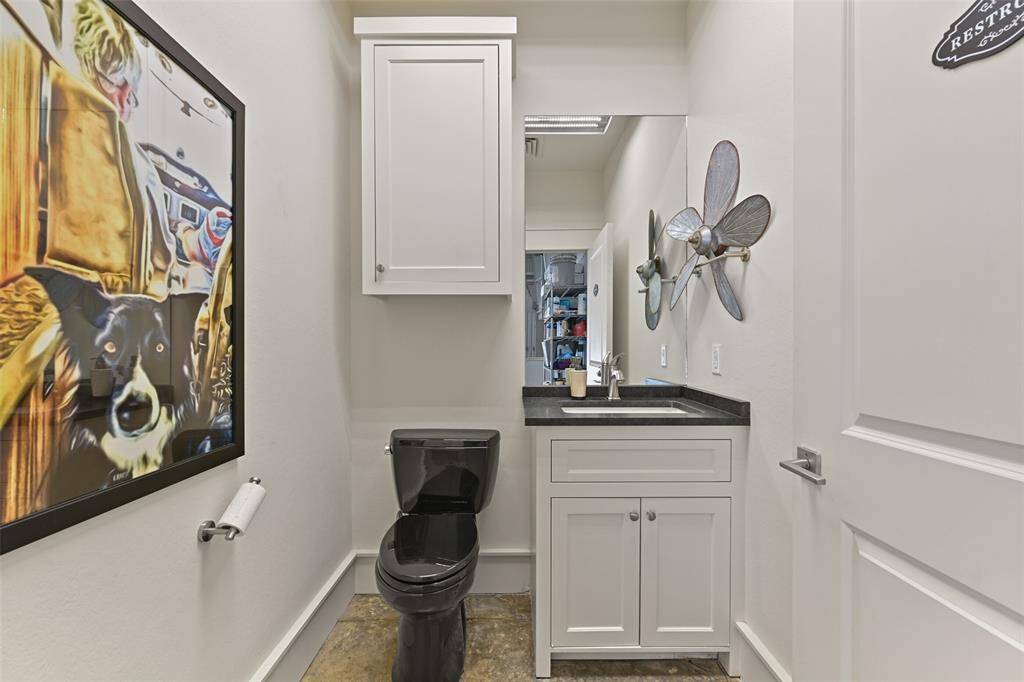 The Hangar bathroom offers convenience with its location, vanity and storage.