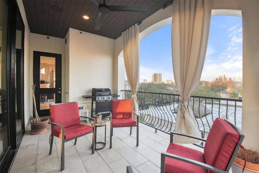 The balcony overlooks downtown and the Texas Medical Center. Walking distance to Shepherd and West Gray in one direction and Kirby and Westheimer in the other.