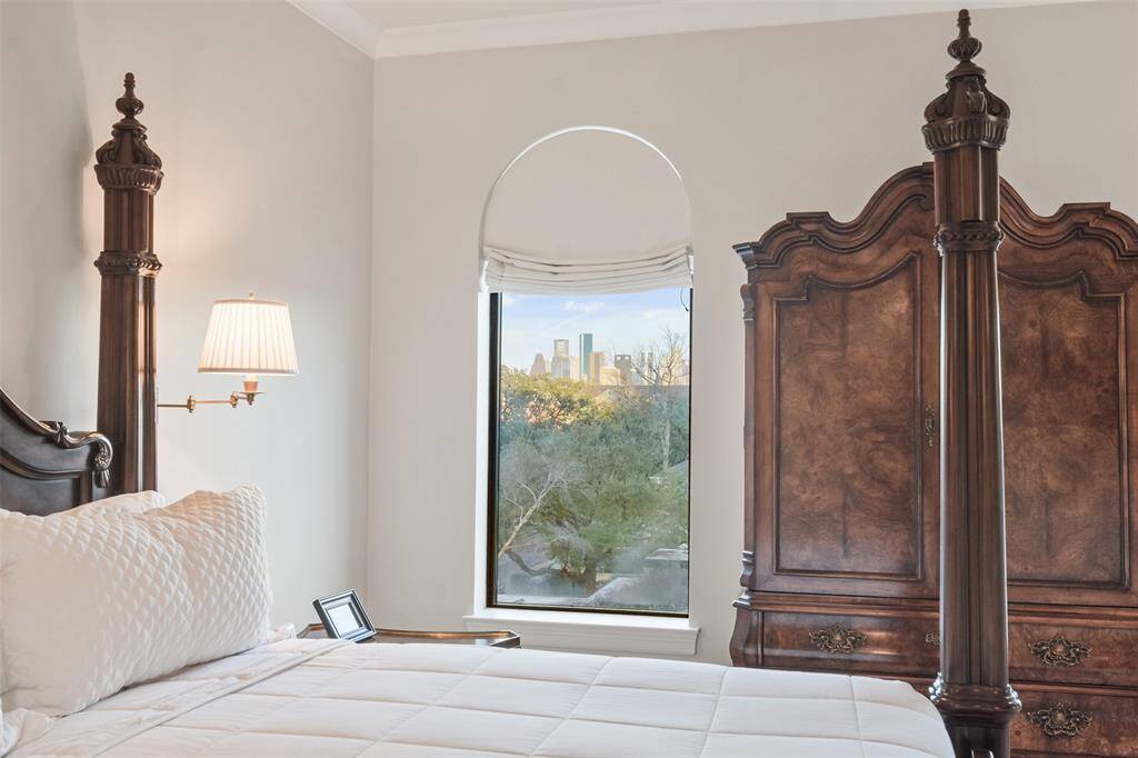 Wake up to downtown views through the custom arched windows.