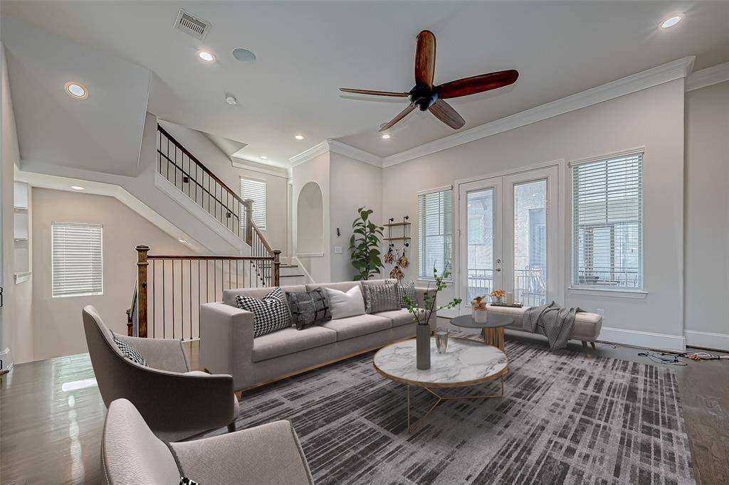 A Modern Layout Featuring a large living room, dining area, and a sleek kitchen, all seamlessly integrated.. Virtually staged. Virtually Staged.