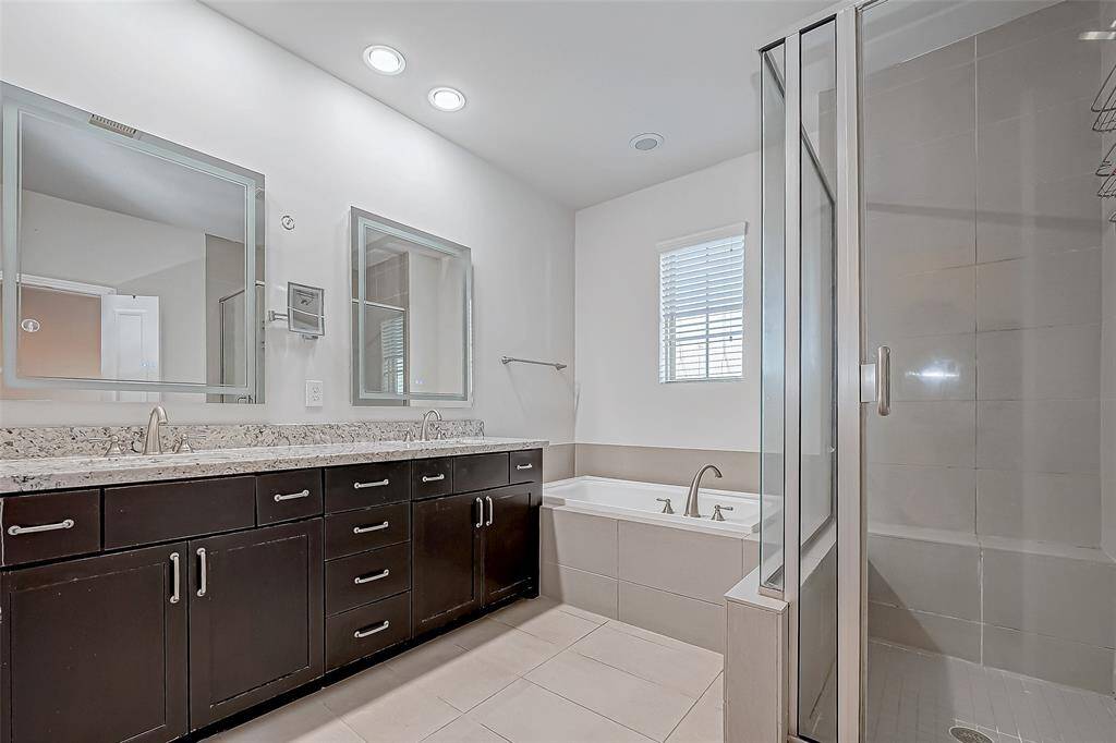 Primary Bath Featuring LED Touchscreen Lighting with Adjustable Lighting & Anti-Fog Feature!