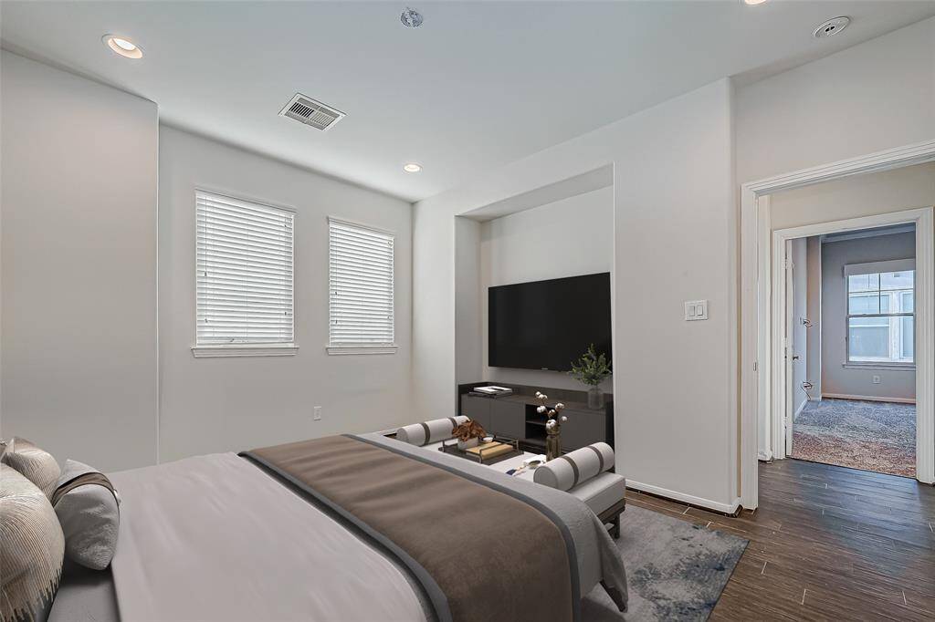 Secondary Bedroom Located on 3rd Floor. Perfect for Nursery! Virtually staged.