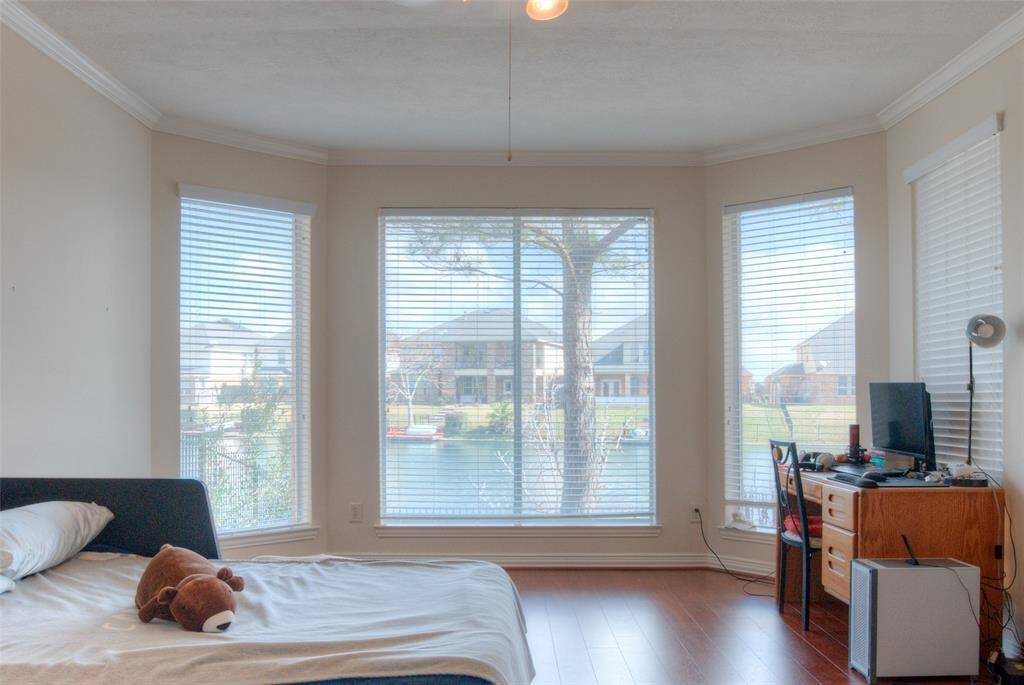 Master bedroom has a fantastic view of the lake.