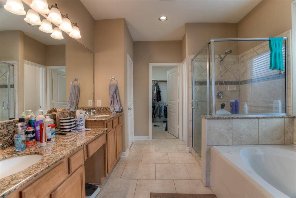 Double sinks in the master bathroom.