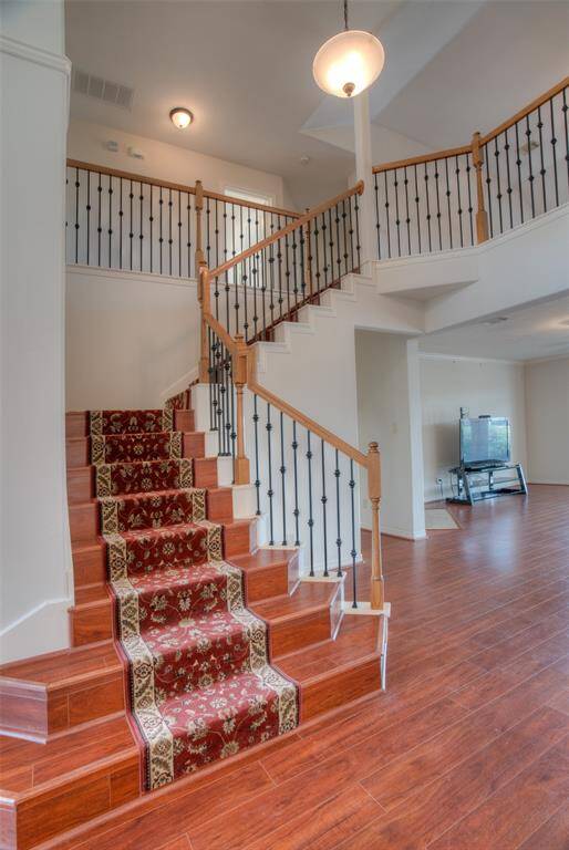 Elegant stairs leading upstairs.