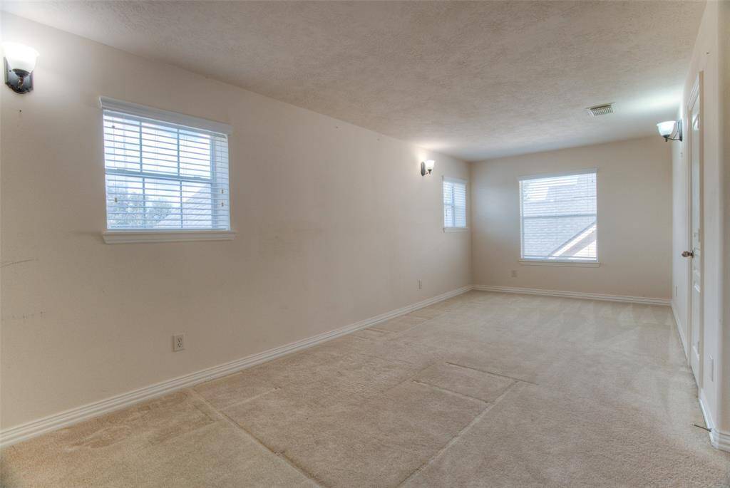 This is considered the bonus room. Large enough to be a secondary master bedroom.