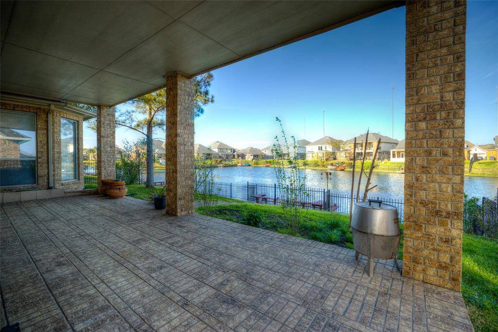 Amazing backyard patio so you can sit and enjoy the lake.