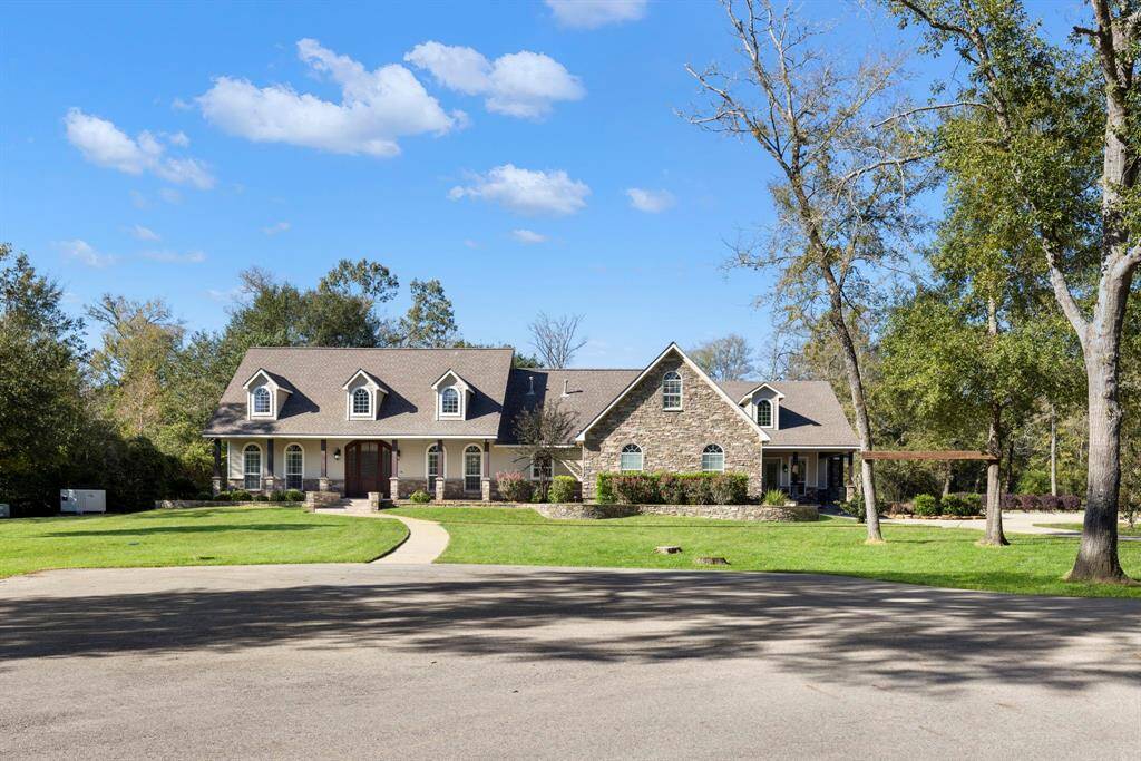 The front of the home offers an abundance amount of parking space.