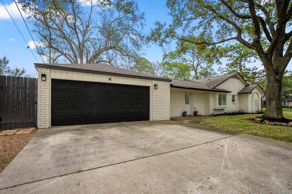 At the side of the home i sthe attached garage! You'll love living on a corner lot!