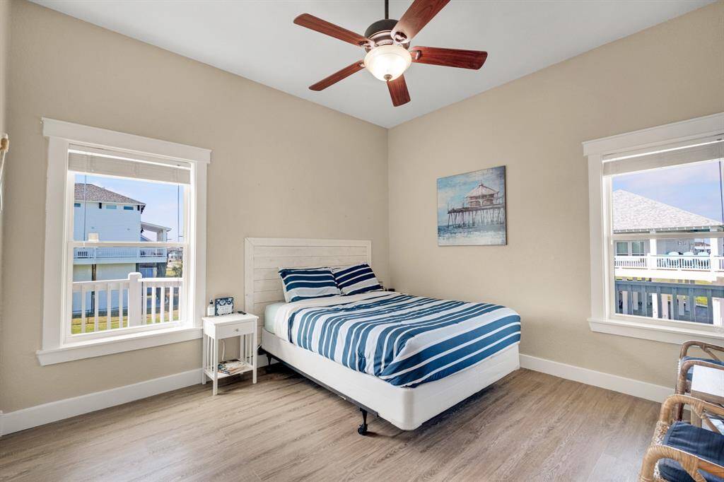 Cozy main floor bedroom featuring a built-in queen bed.