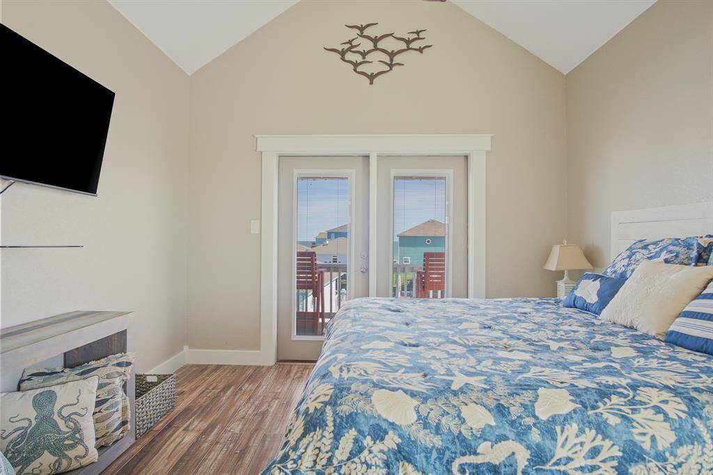 Enjoy a private third-story balcony off the bedroom, offering exclusive views and relaxation.