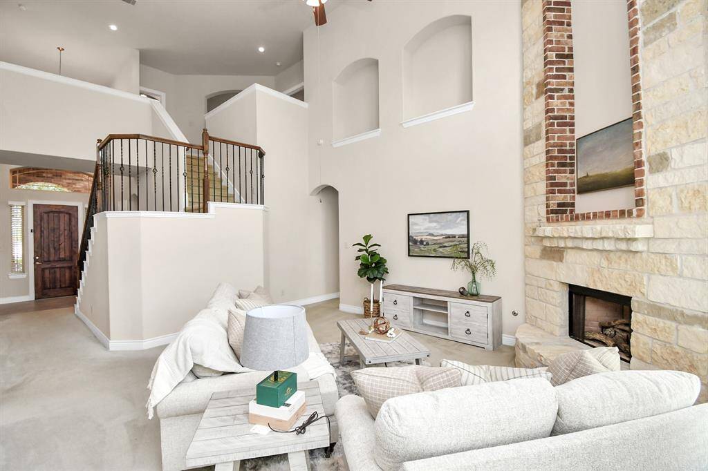 Tall ceilings in the living area with great windows for natural lighting.