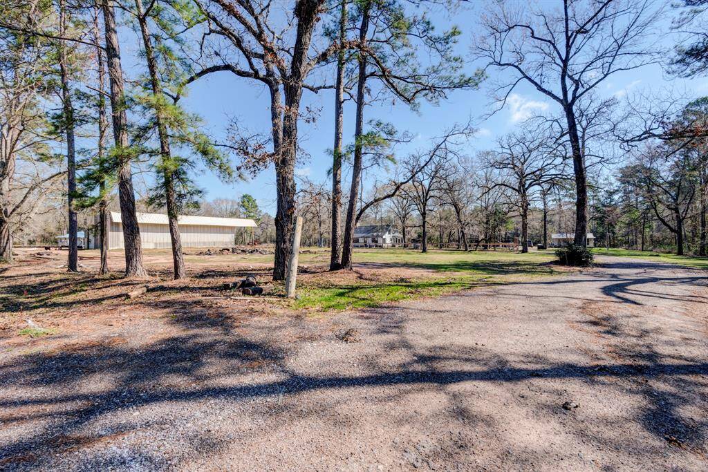 Driving up to the property.  Entrance provides an asphalt driveway.