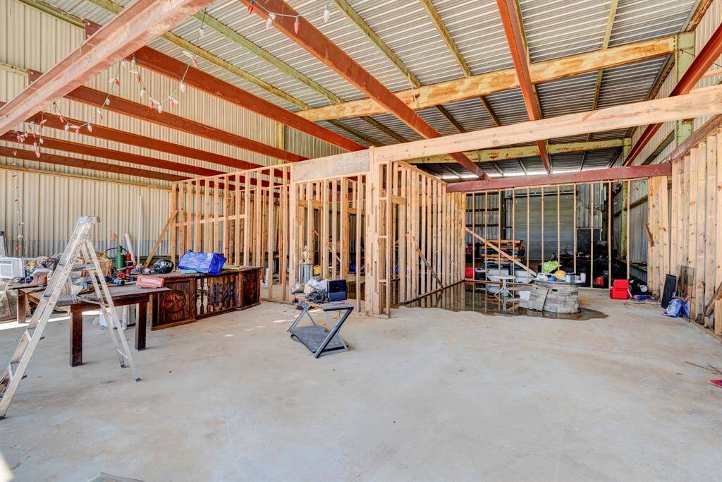 Unfinished 2 story barndominium or can be used for a shop, warehouse, or storage for boats and RVs.