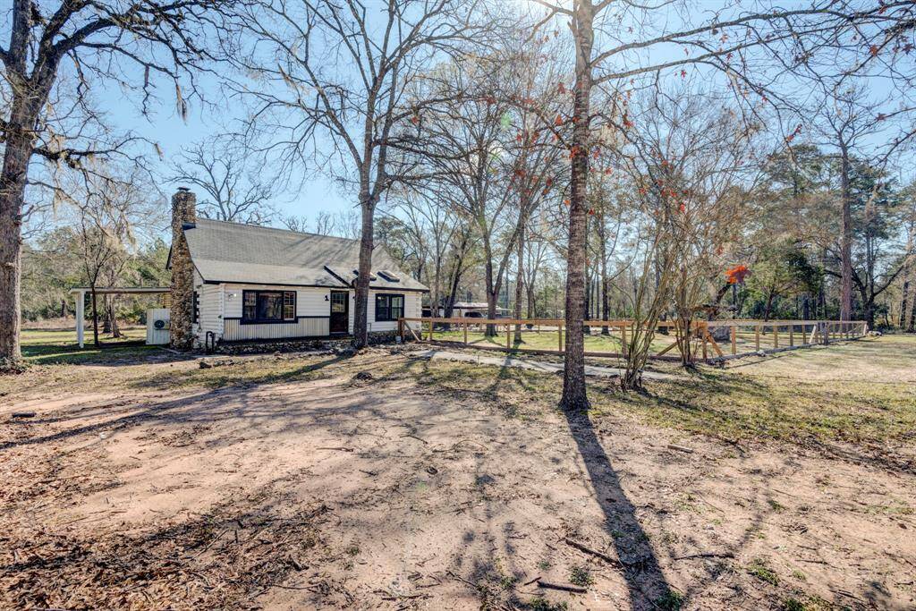 1900 sqft log cabin in the front of the property.  It is cross fenced to allow the animals to stay close to the home.
