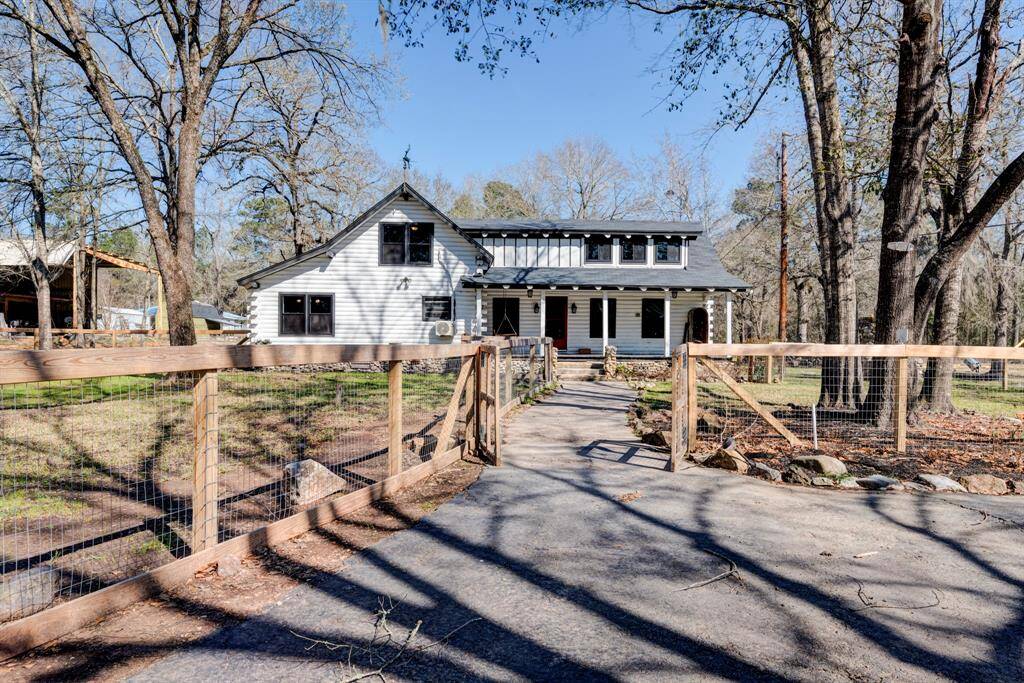 Walkway to the entrance of the log cabin.