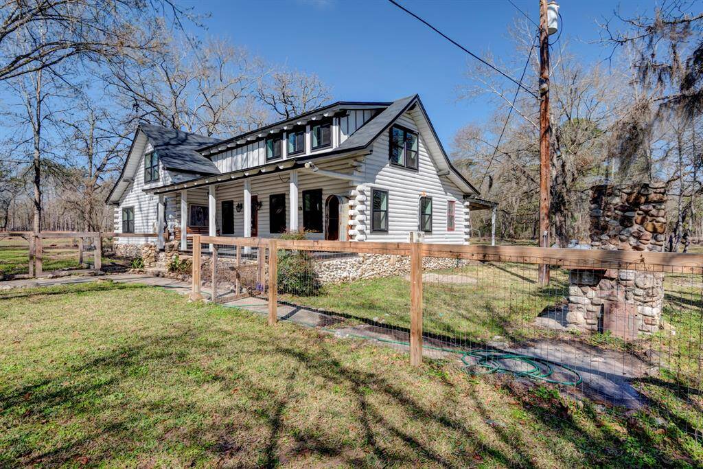 Log cabin/main house. Offers 3 bedrooms 2.5 baths.