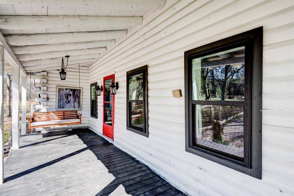 Front porch of the home.  New windows were recently put in the entire home.