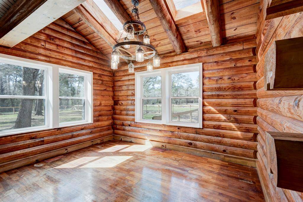 Dining area provides natural light, a scenic view of the front of the property and the windows have recently been updated.
