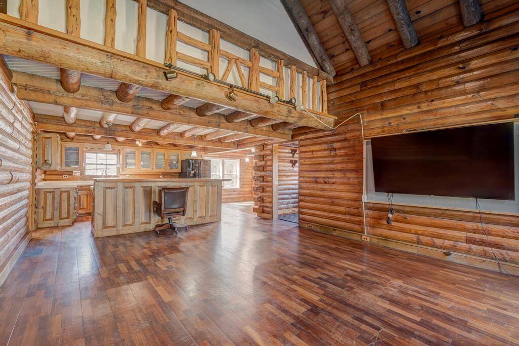 Open floor concept to this rustic built log cabin.  Very cozy feel yet large enough for family gatherings or office parties.