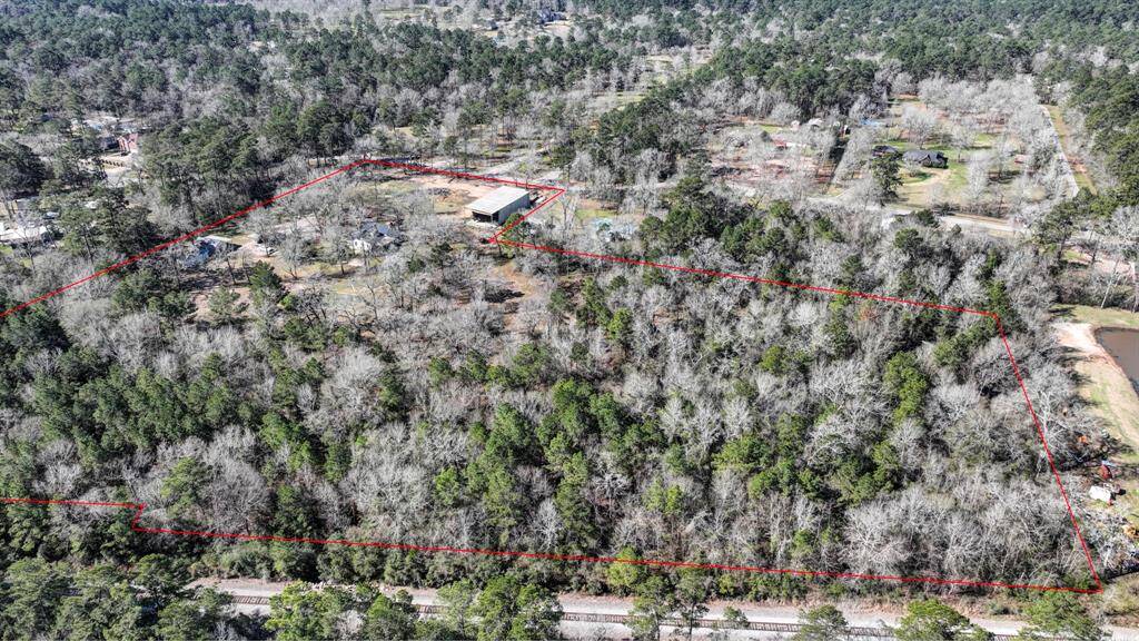 Backside of the property.  Plenty of hardwoods on the property.